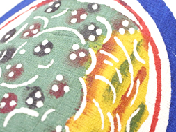 丸紋に野菜の柄型絵染紬名古屋帯　国画会会員　小島悳次郎作